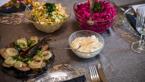 An elegant table setup with diverse salads and appetizers, perfect for a gourmet meal.
